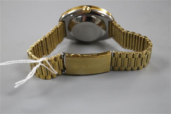 A gentlemans gilt stainless steel Rado Diastar automatic day/date wrist watch.